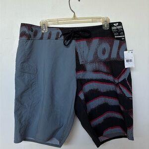 Volcom Gray and Black Board Shorts with Urban Art Design
